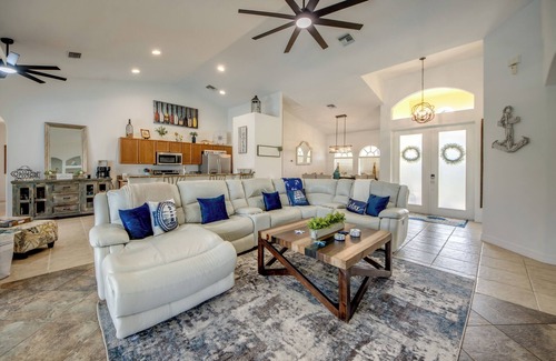 Pelican Villa | Spacious 4 BR/3 bath waterfront Villa with heated pool, spa, kayaks and bikes