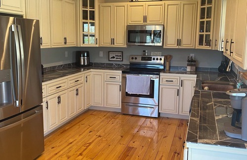 Burkesville House | Spacious 4-BR house w/wraparound porch, fire pit area and hot tub -Sleeps 18-20