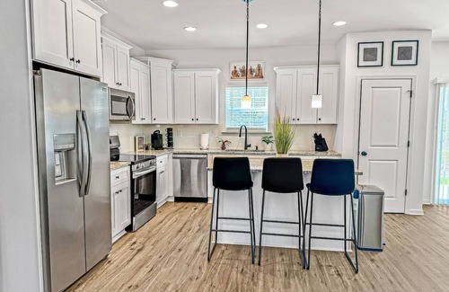 Toddville Road House | Spacious 5-bedroom house in Prime Charlotte Location with Garage & Fenced Yard