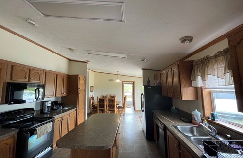 Drexel House | Spacious 5-bedroom house overlooking a serene 20 acre lake
