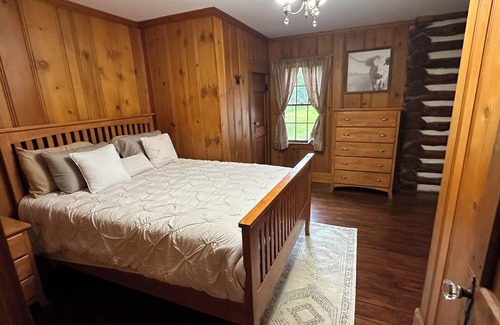 Moberly Other | Spacious 5-bedroom log cabin home with 2 ponds and 50 acres just outside Moberly
