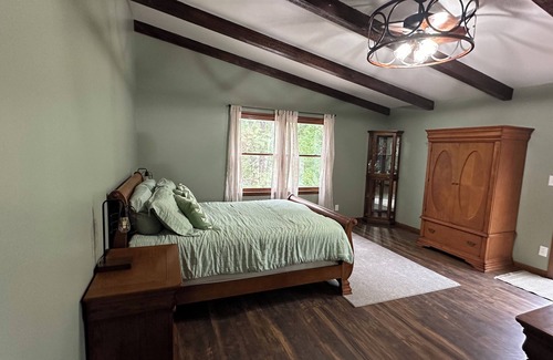 Moberly Other | Spacious 5-bedroom log cabin home with 2 ponds and 50 acres just outside Moberly