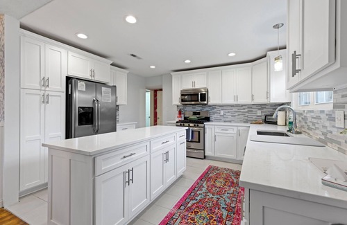 Indianapolis House | Spacious 5-bedroom house w/1.5 Kitchens & Beautiful Yard near Broad Ripple