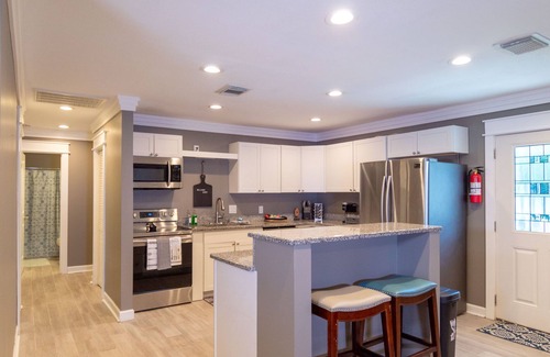 Highland City House | "Spacious 5-Bedroom Home with Versatile Living Areas and Private Pool