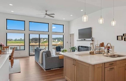 New Lisbon House | Spacious 5BR Lakefront Retreat with Kayaks, Private Beach, Arcade, and Firepit