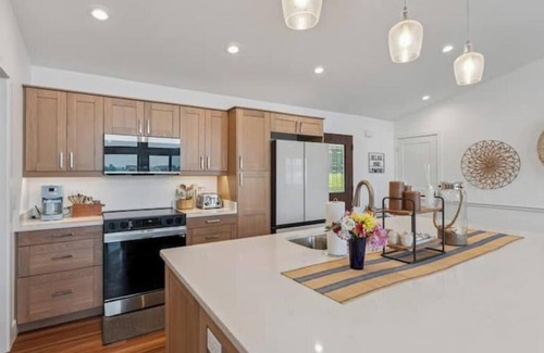 New Lisbon House | Spacious 5BR Lakefront Retreat with Kayaks, Private Beach, Arcade, and Firepit