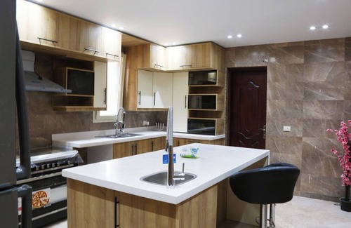 Giza Governorate Villa | Spacious 6-bedroom mansion in enjoyable 6th of October City with WiFi, AC