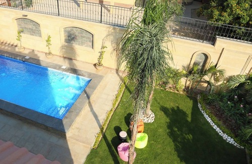 Giza Governorate Villa | Spacious 6-bedroom mansion in enjoyable 6th of October City with WiFi, AC