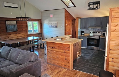 Swiss Meadows Ski Chalet | Spacious 6-bedroom Swiss style chalet in with Hot-tub for 14 people .