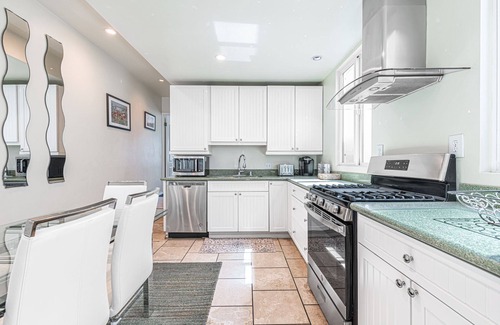 West Newport Condo | Spacious 8BR Tri-Level Home w/Ocean Views, Multiple Patios & Steps to 43rd St Beach!