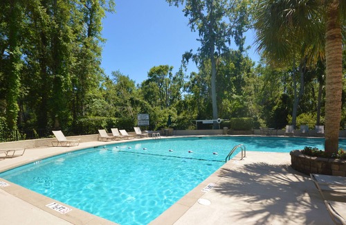 Hilton Head Island Condo | Spacious all-suite villa with lagoon views, screened porch, and shared pool