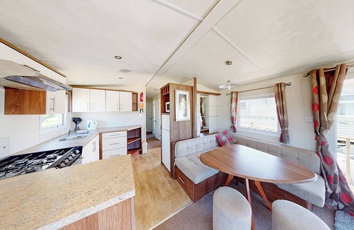 Ludchurch House | Spacious and well-presented 12ft-wide caravan with one double and one twin.