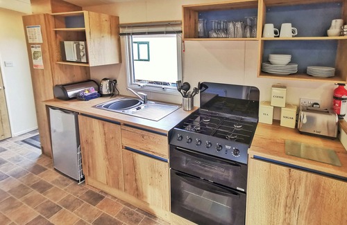 Ludchurch Apartment | Spacious and well presented 12ft wide caravan with one double and two twin.