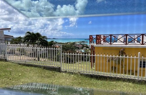 Dickenson Bay Apartment | Spacious apartment 5 mins walk to the Beach