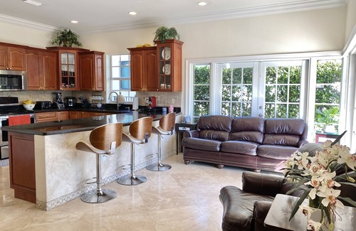 Garden Isles House | Spacious, beautiful 4 bedroom house with heated pool 10 min from Beach.