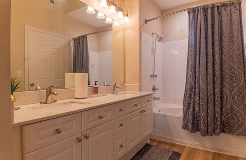 Dunwoody Apartment | Spacious Bedroom near major headquarters and shops