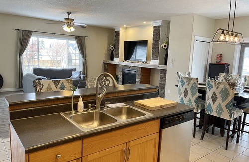 Jasper Place House | Spacious bungalow with large backyard and garage close to West Ed Mall