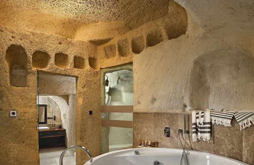 Urgup Hotel | Spacious Cave Room Offering Perfect Backdrop | Outdoor Pool Access