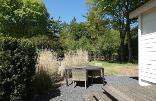 Marum Ski Chalet | Spacious chalet for rent with nice view over the grounds against forest
