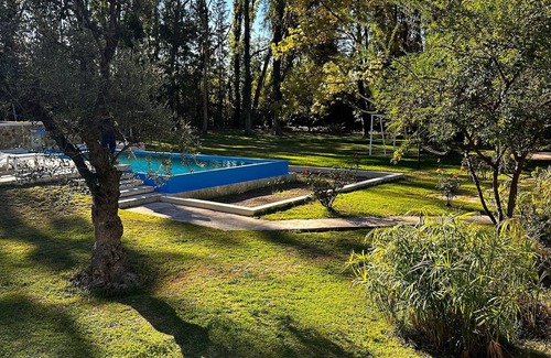 Chacras de Coria Ski Chalet | Spacious chalet with 9 bedroom,AC, WiFi, pool, 8000m2 park in Chacras de Coria