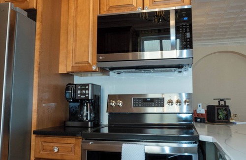 Edgerton Condo | Spacious Condo: Historic Boutique Rental in Downtown Edgerton