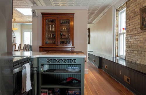 Edgerton Condo | Spacious Condo: Historic Boutique Rental in Downtown Edgerton