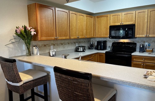New Smyrna Beach Condo | Spacious condo in desirable Ocean Walk complex with ocean views & large balcony!