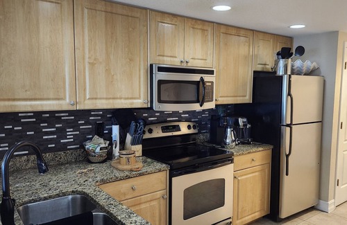 Capri Isle Condo | Spacious Condo, Super Clean & Prime Location