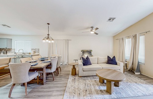 Canyon Ridge West House | Spacious desert home with hot tub, covered patio, grill, & modern finishes