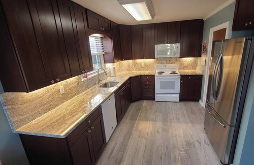 Country Club Estates House | Spacious Dog-Friendly Home with Multiple King & Queen Beds, Yard & Porch