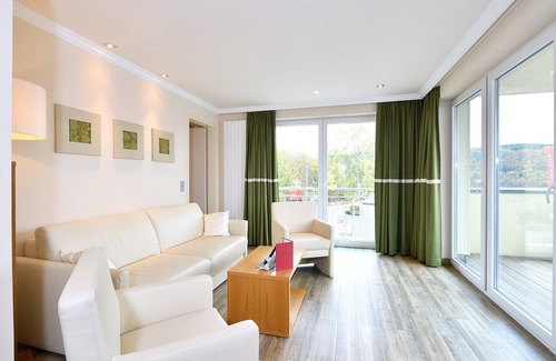 Heimbach Apartment | Spacious double suite with balcony and lake view