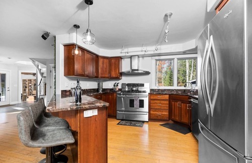 Bellaire House | Spacious Downtown Home with Private Dock, Large Decks, Solo Stove Firepit, Sauna