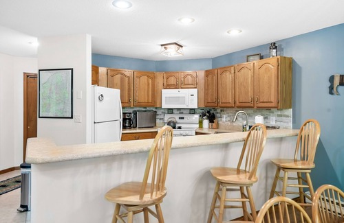 North Creek House | Spacious end unit townhome w/gas fireplace, deck & grill- minutes to ski lifts