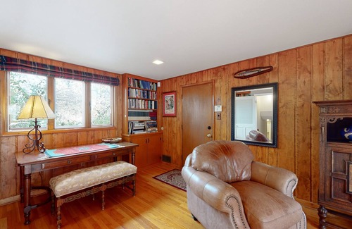 Skyway House | Spacious estate with fenced yard, private pond, outdoor fireplace, & home gym