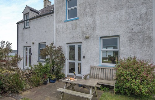 Drummore Cottage | Spacious family cottage with open fire and garden overlooking the sea.