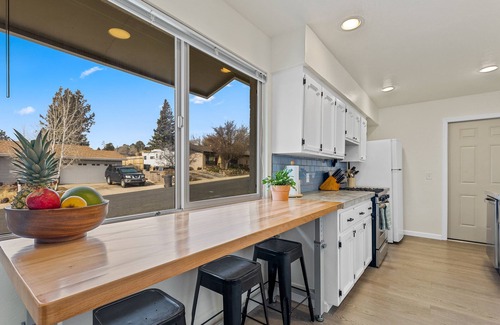 Swiss Manor House | Spacious family home at base of Mt. Elden w/Cedar-plank Sunroom & Hot tub