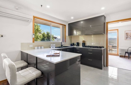 Lutana House | Spacious Family Home with Views