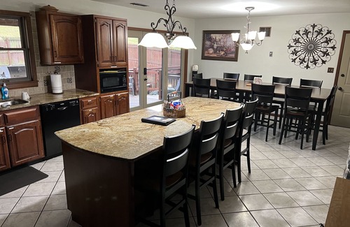 Keene House | Spacious family Lodge with solar heated pool, hot tub, fire pit and EV charger.