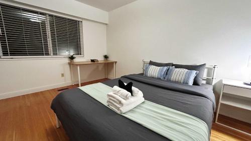 Fraserview House | Spacious Family Room with Shared Washroom