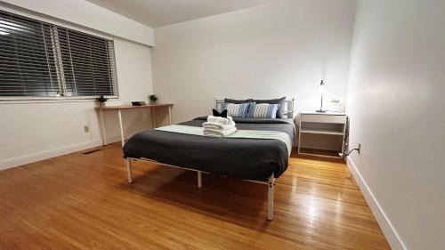 Fraserview House | Spacious Family Room with Shared Washroom