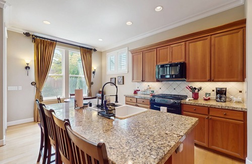 Renton House | Spacious getaway home with fireplace, private patio & grill