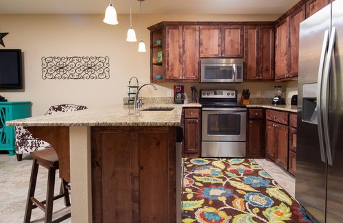 New Braunfels Condo | Spacious, ground floor, upscale and gated on the Guadalupe River! Pool!