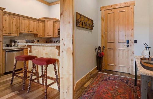 Victor Condo | Spacious ground-level condominium with large patio and private office/bedroom