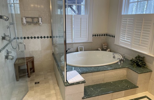 Dufferin Bed & Breakfast | Spacious Guest Master Bedroom Rm 4 w/private deck & hot tub