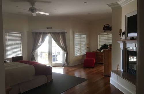 Dufferin Bed & Breakfast | Spacious Guest Master Bedroom Rm 4 w/private deck & hot tub