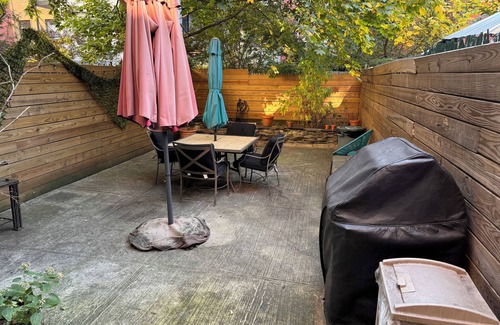 Harlem House | Spacious Harlem Brownstone Garden 2-Bedroom Apartment with a large rear yard,
