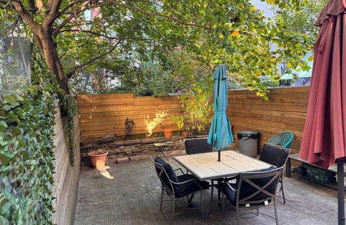 Harlem House | Spacious Harlem Brownstone Garden 2-Bedroom Apartment with a large rear yard,