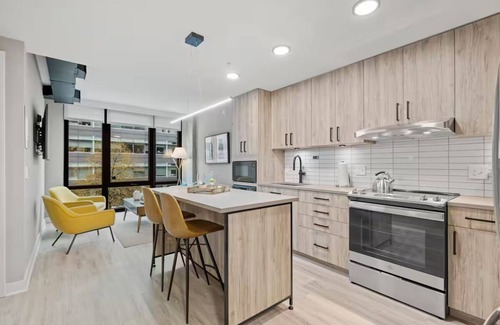 Navy Yard Hotel | Spacious Haven | Kitchen & Desk | DC Stay w/Coworking & Gym | Near Iconic Spots