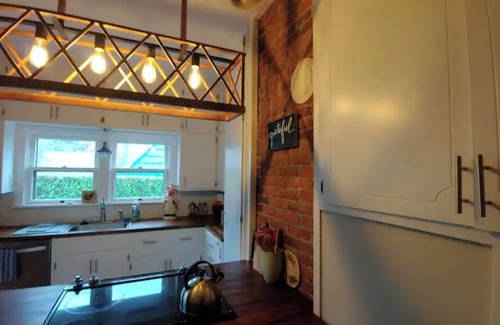 Albany House | Spacious Historic Home with Fireplace in Downtown