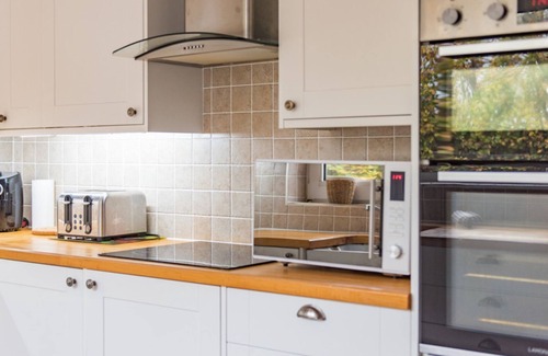 Martin House | Spacious holiday home with panoramic views of the sea and golf course
